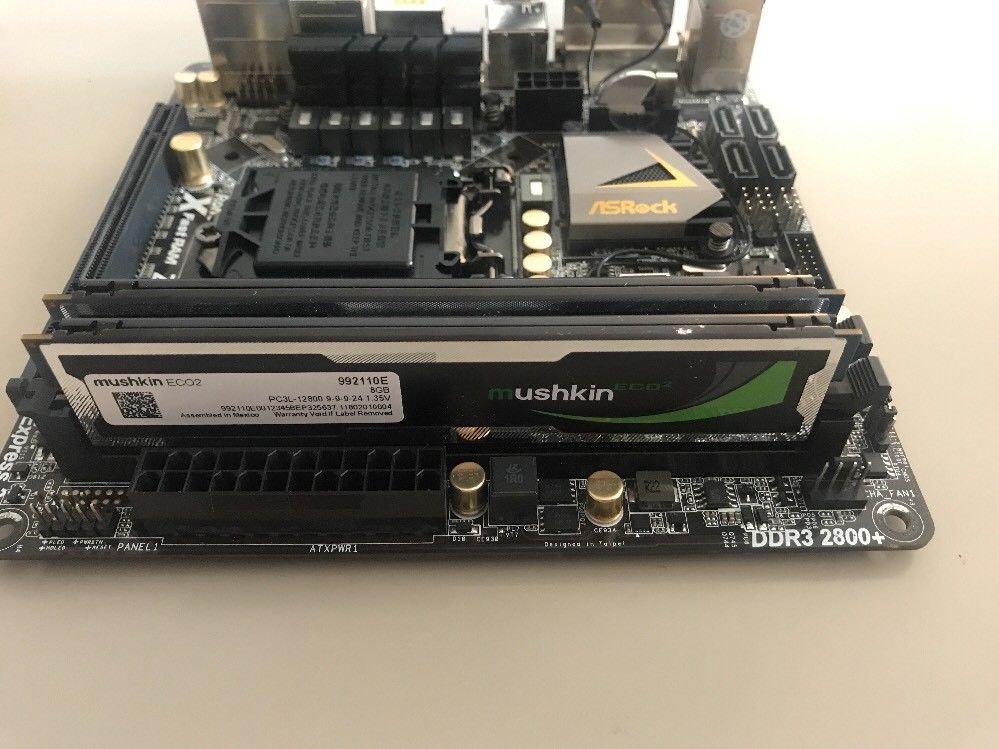 For sale ASRock Z77E-ITX LGA 1155 motherboard with 16GB RAM and BCM4352 PCIe card